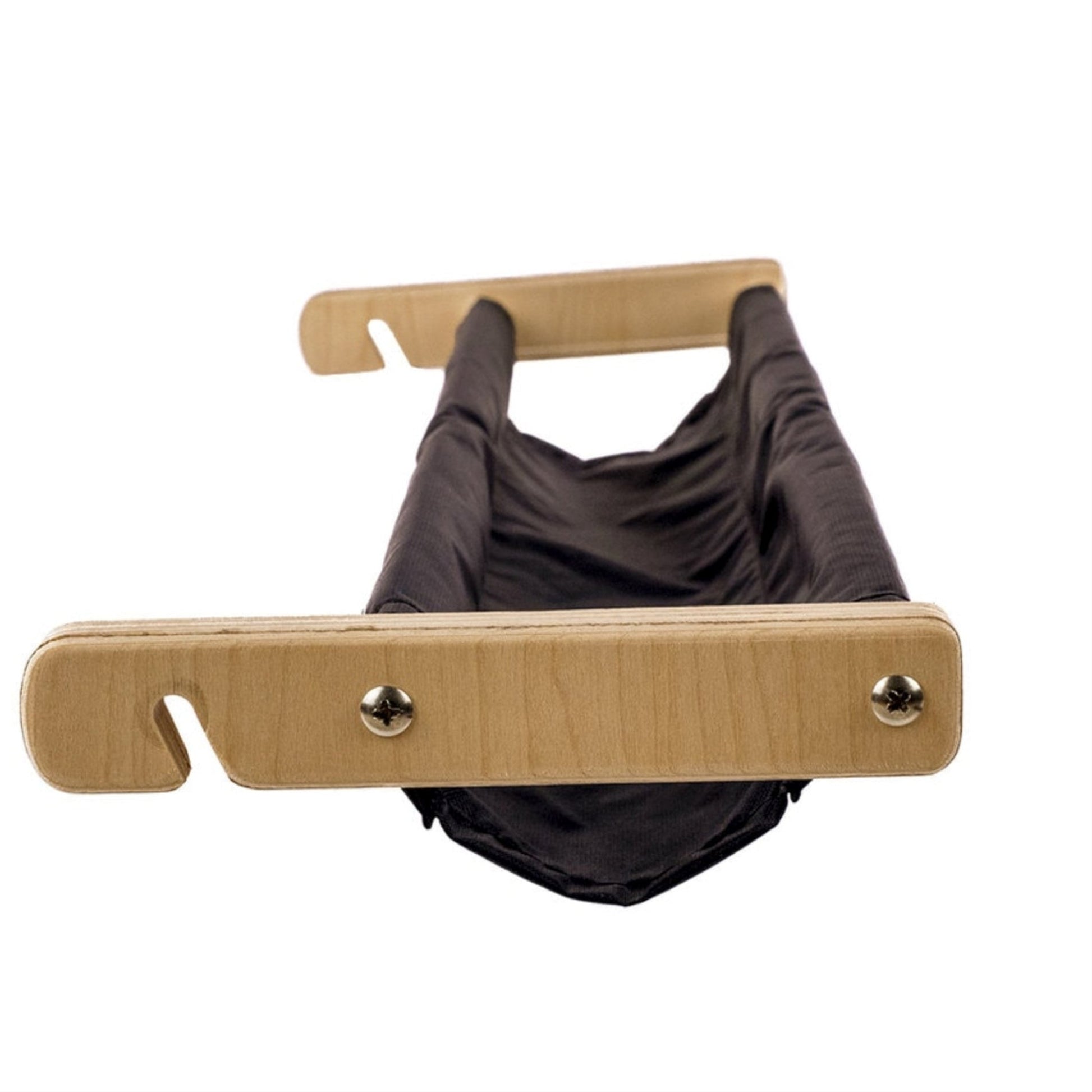 The Schacht 15" Cricket Trap by Schacht Spindle Co. is a black fabric foot hammock featuring light wooden supports and metal screws. It hangs between two horizontal boards, offering a comfortable rest for your feet, making it perfect for under-desk use. Designed like an accessory organizer, the wooden supports are equipped with hooks for easy attachment.