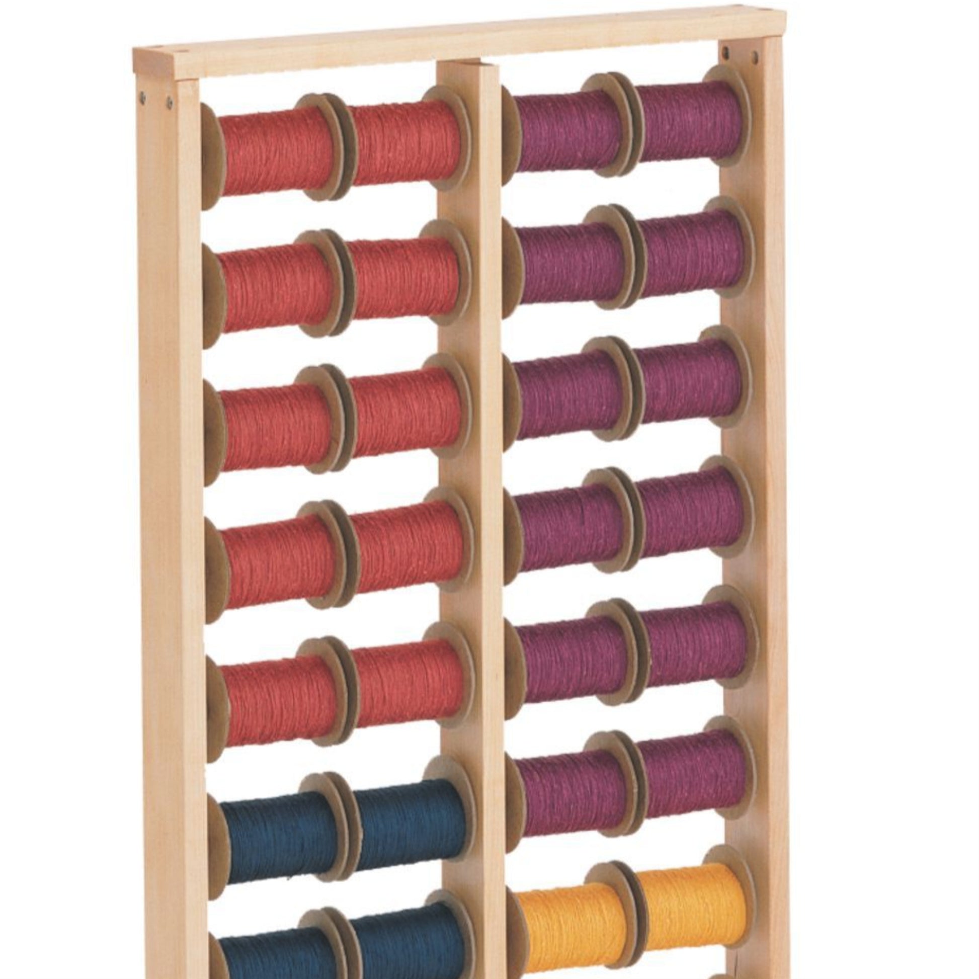 The Schacht Spool Rack by Schacht Spindle Co. holds multiple rows of colored spools of thread. Organized by color, with shades of red, pink, purple, blue, and yellow, the rack features two vertical columns with five rows each. Ideal for sectional warping projects or neatly storing yarn tubes in place.