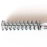 A close-up image of a metal compression spring against a white background. The spring is cylindrical and tightly coiled, gradually widening from a narrow to a broad coil towards the end, similar to the tension found in components like the Schacht Heddle Bar Hook by Schacht Spindle Co.