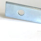 A close-up image of the Schacht Top Pawl for Wolf Looms Cloth Beam from Schacht Spindle Co. The rectangular metal piece features a circular hole near one end and is set against a plain white background, showcasing its slightly reflective, polished surface which indicates it's a precise replacement part for Wolf looms.