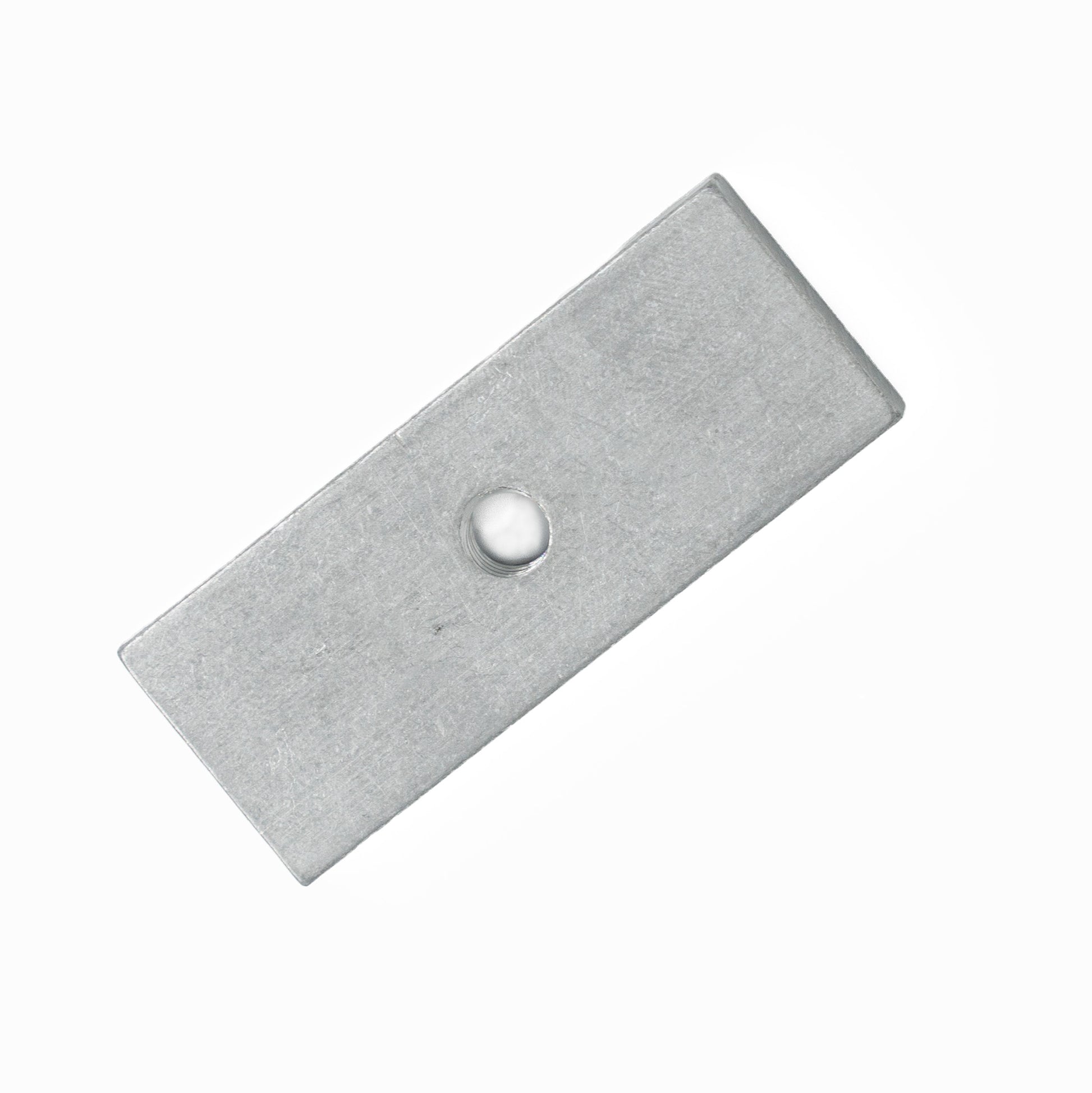 A Schacht Spindle Co. Wolf Loom T-Nut for Fold Knob, with a smooth rectangular metal surface and a single circular hole in the center, is displayed against a plain white background.