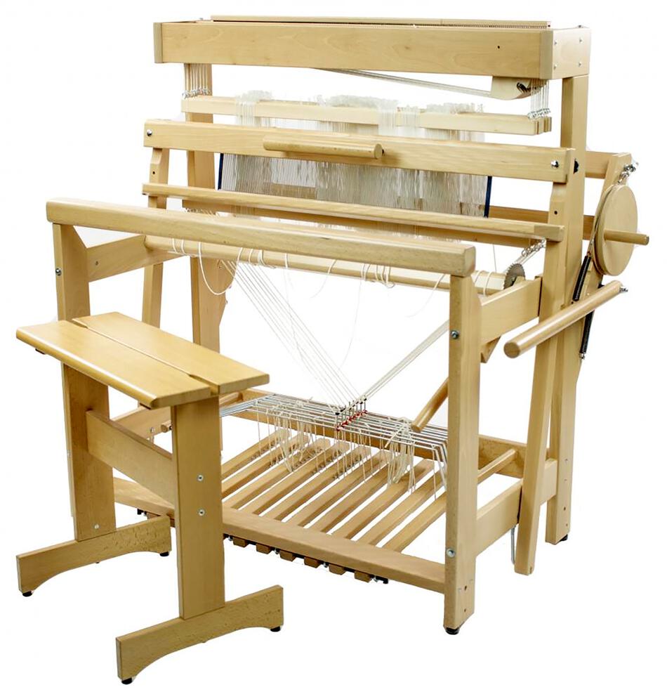 The Louët David 3, 8-Shaft Floor Loom by Louët Inc. is a wooden floor loom accompanied by a bench, featuring an intricate setup of threads and heddles. This sophisticated loom includes multiple levers, pedals, and a side crank to facilitate its weaving mechanism, with the bench positioned in front for ease of use.