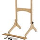 The Louët Loom Floor Stand by Louët Inc. is a wooden, adjustable stand with a wide base and a central vertical support, specifically designed for the Louët Jane Table Loom. It includes a metal bracket, two small black knobs, and two L-shaped wrenches laid out in front, making it perfect for holding or displaying your weaving masterpiece.