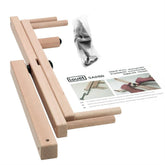 A stand-alone skeinwinder kit, crafted from solid Beech wood, is on display. The Louët Inc. kit includes multiple wooden parts, metal screws, and bolts. An instruction manual with images of the assembly process accompanies the product name "Louët Stand Alone Skeinwinder" and model number "S40100".