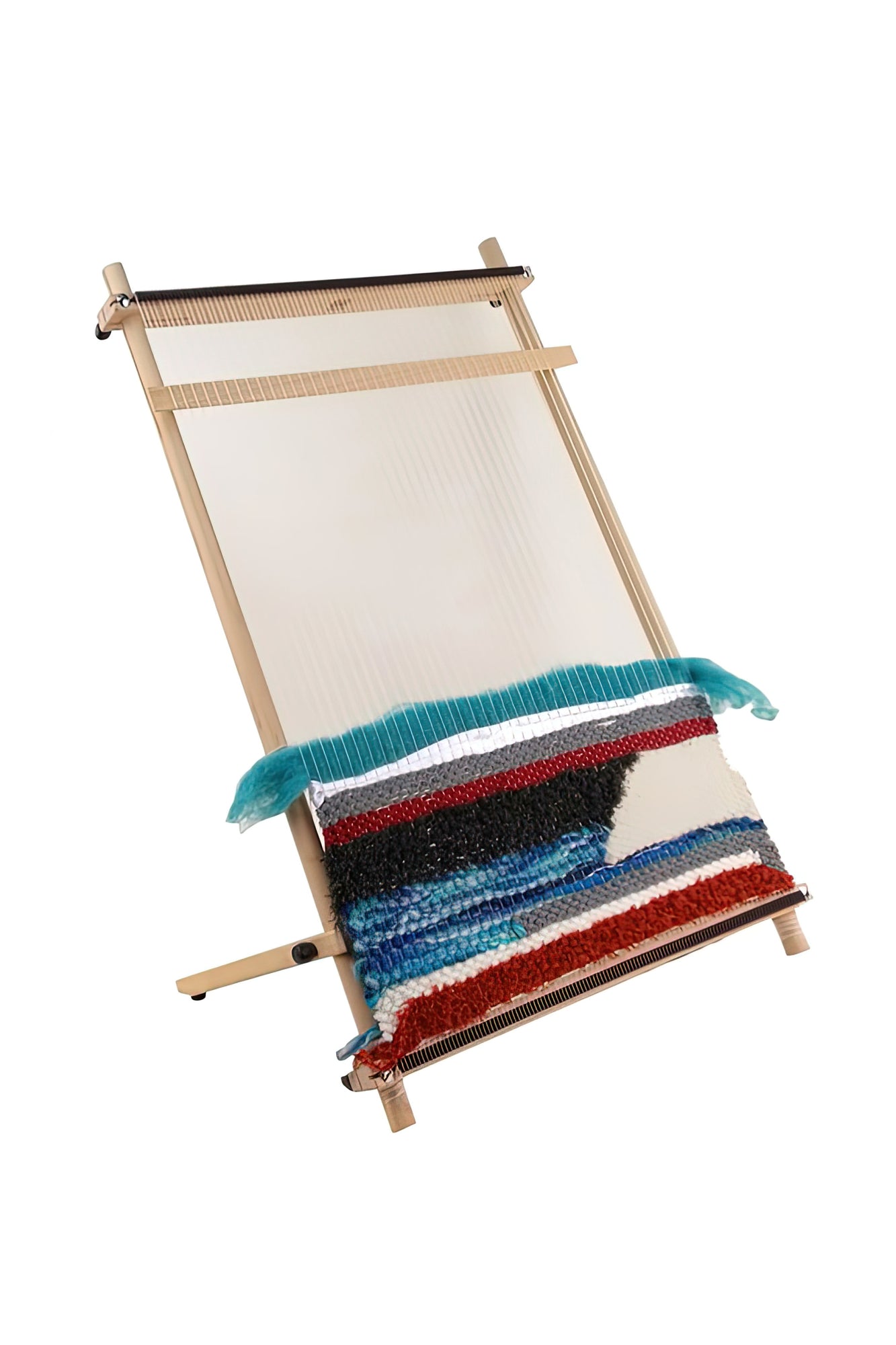 A standing Louët Lisa Tapestry Loom by Louët Inc., showcasing a vibrant piece of woven fabric in progress. The fabric exhibits horizontal stripes in an assortment of textures and colors, including red, blue, black, and white, with teal yarn extending from the loomed section.