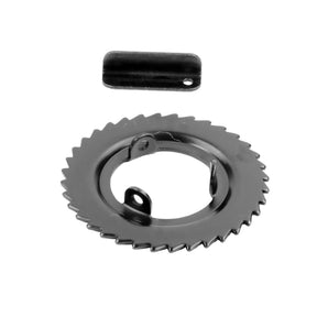 The Louët Rachet Wheel and Pawl for Klik/Jane/David/Spring/MD by Louët Inc. includes a black circular gear with sharp teeth resembling a ratchet wheel, featuring a central hole and two small protrusions. Next to it is a small black rectangular tab with a hole on one end, all set against a white background, making it an ideal replacement part for your Louet Loom.