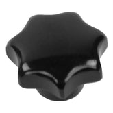 Introducing the Louët Jane Star knob M6 by Louët Inc.—a sleek, black, star-shaped knob featuring six rounded points, perfect for enhancing your Jane loom. Its shiny finish provides a polished appearance, while its smooth surface suggests it is crafted from high-quality plastic or metal.