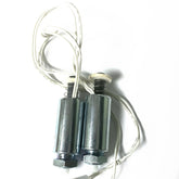 The image shows two metallic Louët Interface solenoids from Louët Inc. connected side by side. They feature cylindrical bodies and are attached at one end with tangled white electrical wires. The solenoids, which appear to be spring-loaded, have a threaded section at the bottom for mounting.