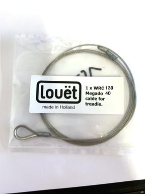 A coiled metal cable with a loop at one end is packaged in a clear plastic bag. A white label on the bag reads "Louët Inc., made in Holland, 1 x Louët Megado Treadle Cable.