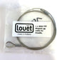 A coiled metal cable inside a transparent plastic bag. The bag features a white label with black text that reads "Louët Inc. made in Holland" and "1 x WRQ 143 Louët Megado Treadle Cable for Louet Megado looms." The replacement cable has looped ends with metal fasteners.