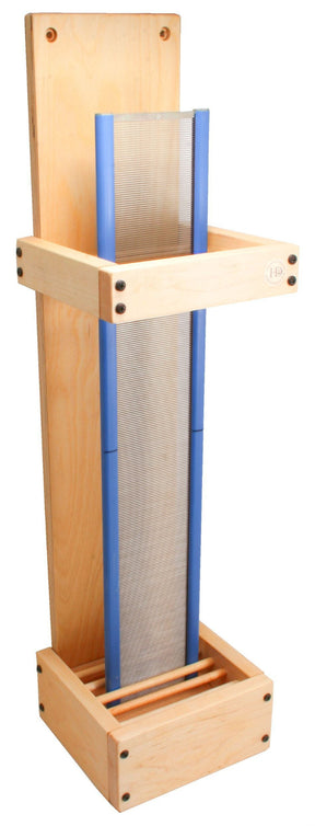 Introducing the Reed Stand / Rack - Harrisville from Harrisville Designs: a handmade wooden manual paper press standing upright, featuring a tall rectangular frame meticulously crafted from Baltic birch plywood with a mesh screen in the center. The frame is reinforced with screws at the corners and adorned with sleek blue accent pieces along the sides for an elegant finish.