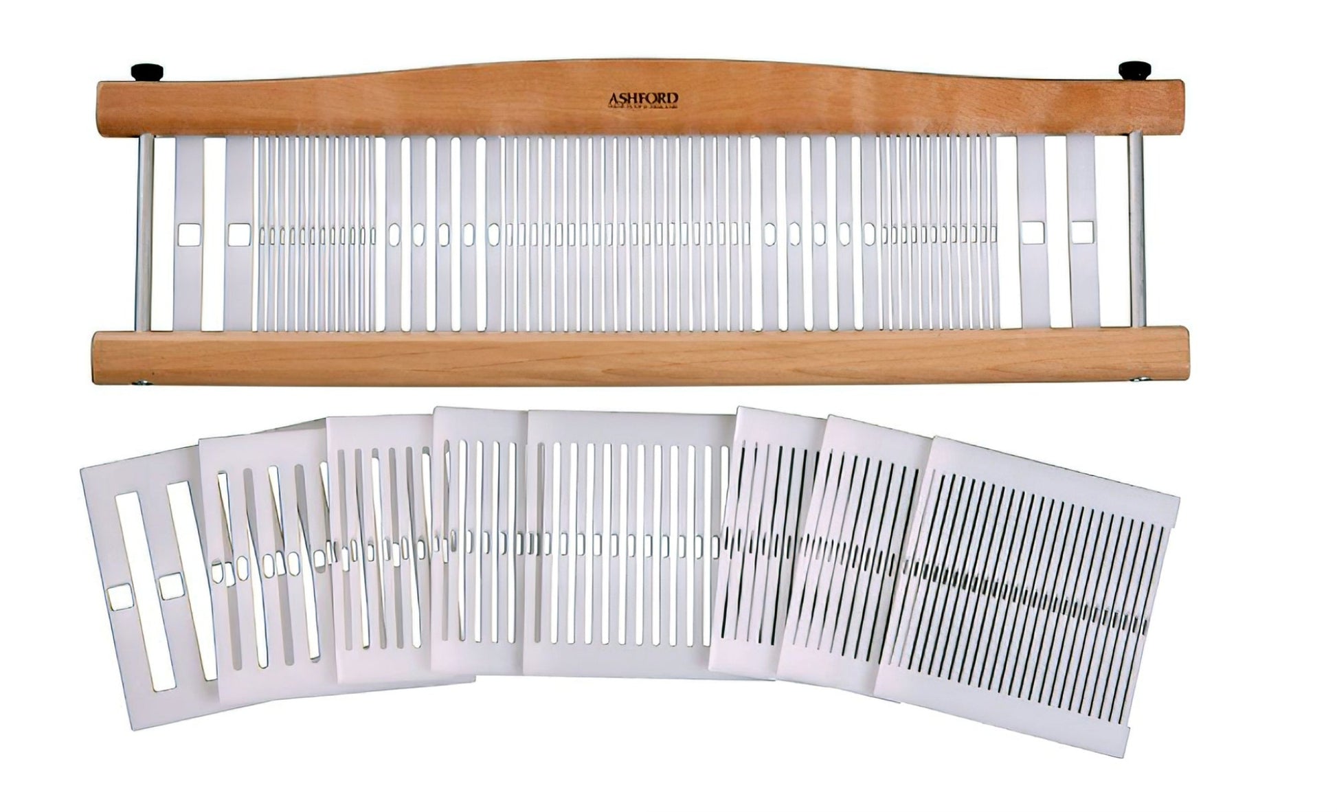 The Ashford Vari Dent Reed Kit from Ashford Handicrafts Limited includes a wooden weaving loom with a rectangular frame and metal bars that feature evenly spaced slots. Several white plastic heddles with various slot and hole configurations are included, making it perfect for accommodating different yarn weights when using the Ashford Vari-Dent reed.