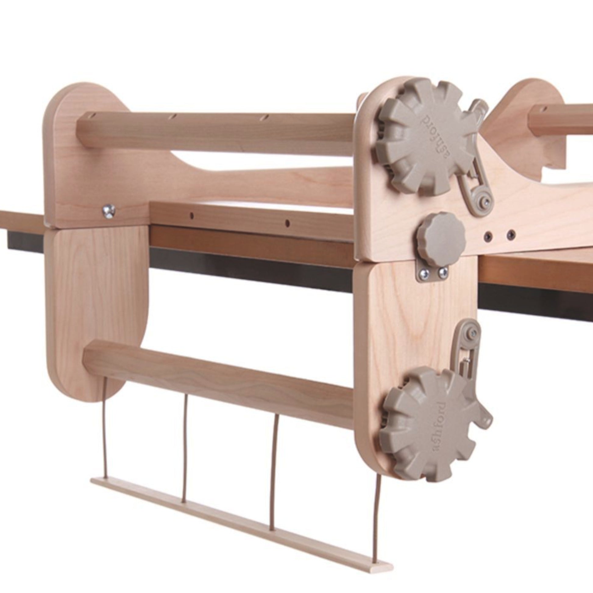 The Ashford Rigid Heddle Freedom Roller by Ashford Handicrafts Limited is a wooden frame assembly with adjustable parts, featuring two large beige plastic knobs and several metal rods extending downward. This component, suited for woodworking or crafting applications, is designed to hold or adjust materials and is ideal for weaving longer lengths.