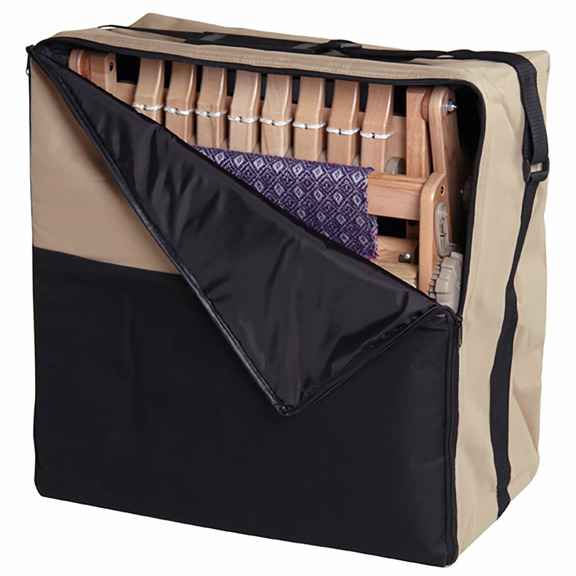 A beige and black sturdy padded Ashford Carry Bag for the Katie 12", 8-Shaft Table Loom with an open flap reveals a wooden loom from Ashford Handicrafts Limited partially visible inside. A piece of woven fabric featuring a purple and white pattern is attached to the loom. The versatile carry bag is equipped with handles for easy portability.