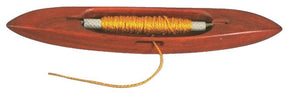 The image shows the Dovetail Woodworks Quill Shuttle, a lightweight wooden weaving shuttle designed in an elongated, boat-like shape, perfect for loom weaving. It holds a cylindrical spool of yellow thread, with one end extending out from the shuttle’s central slot.