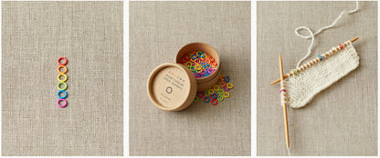 A triptych image features: 1) Nine Cocoknits Colored Ring Stitch Markers arranged vertically on a beige fabric, 2) An open container of Sucre Sucre Mini Rings with some rings scattered, 3) Knitted white fabric on knitting needles adorned with vibrant knitting accessories.