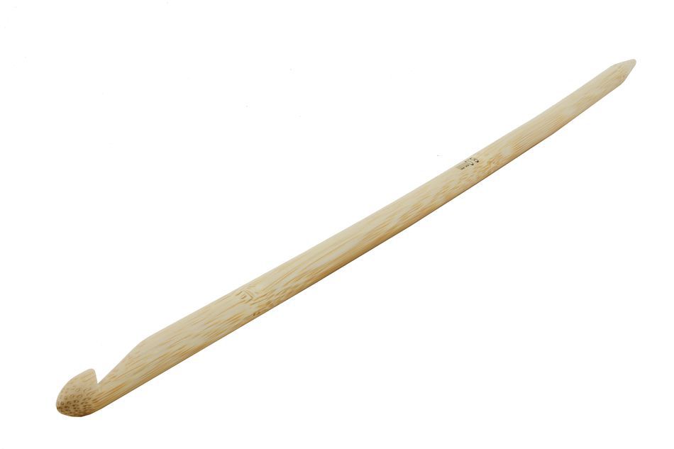 The Bamboo Afghan Hook by Accessories Unlimited is a 14" wooden crochet hook with a smooth, light-colored finish. This long and slender tool features one end with the typical curved design for manipulating yarn, while the opposite end tapers to a rounded point, perfect for Tunisian crocheting.