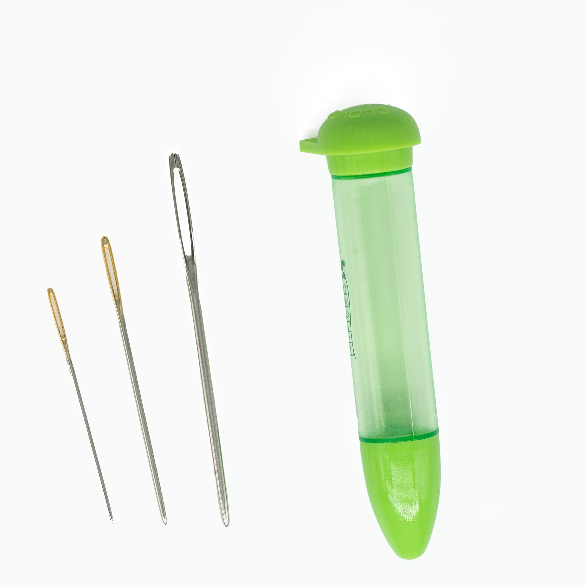 The Chibi 3-needle Tapestry Needle Assortment from Bryson Distributing, Inc. features three straight metal needles of different sizes with elegant gold and silver finishes aligned neatly next to a secure, green, translucent plastic tube case that is capped on one end.