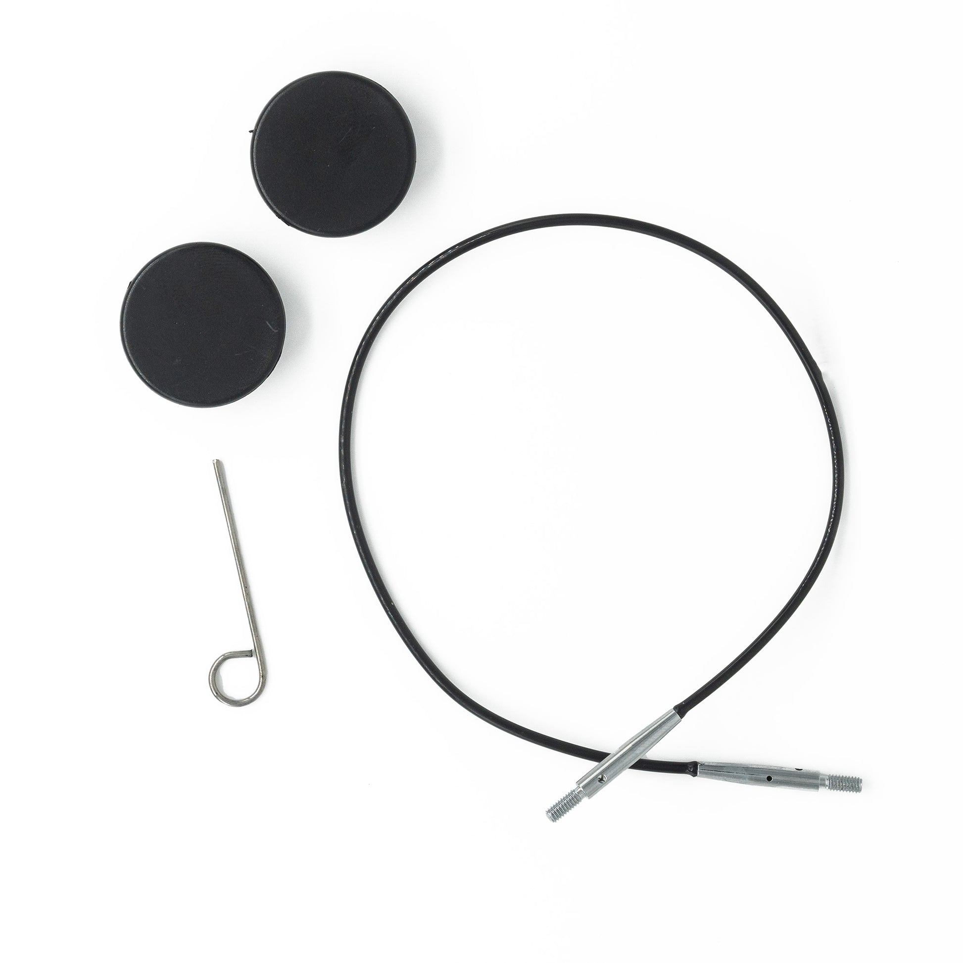 A black cable with metal connectors on both ends, two round black caps, and a metal pin with a looped end, resembling the Interchangeable Circular Needle Cord for Dreamz and Nova by Accessories Unlimited, are arranged on a white background.