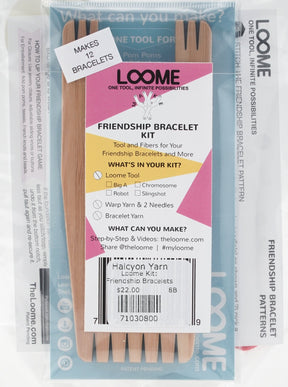 The image displays the Loome Kit - Friendship Bracelets package from Loome, which includes a Loome tool, 12 yarn skeins, an anchor pin, and a pattern booklet. The comprehensive kit prominently boasts "MAKES 12 BRACELETS" at the top left.