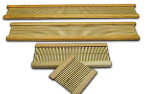 Four rectangular wooden sushi rolling mats of different sizes are displayed. The design, reminiscent of a Beka Rigid Heddle Loom Reed, features thin, slatted bamboo sticks held together with thicker bamboo edges. The largest mat is at the top, followed by progressively smaller mats below.