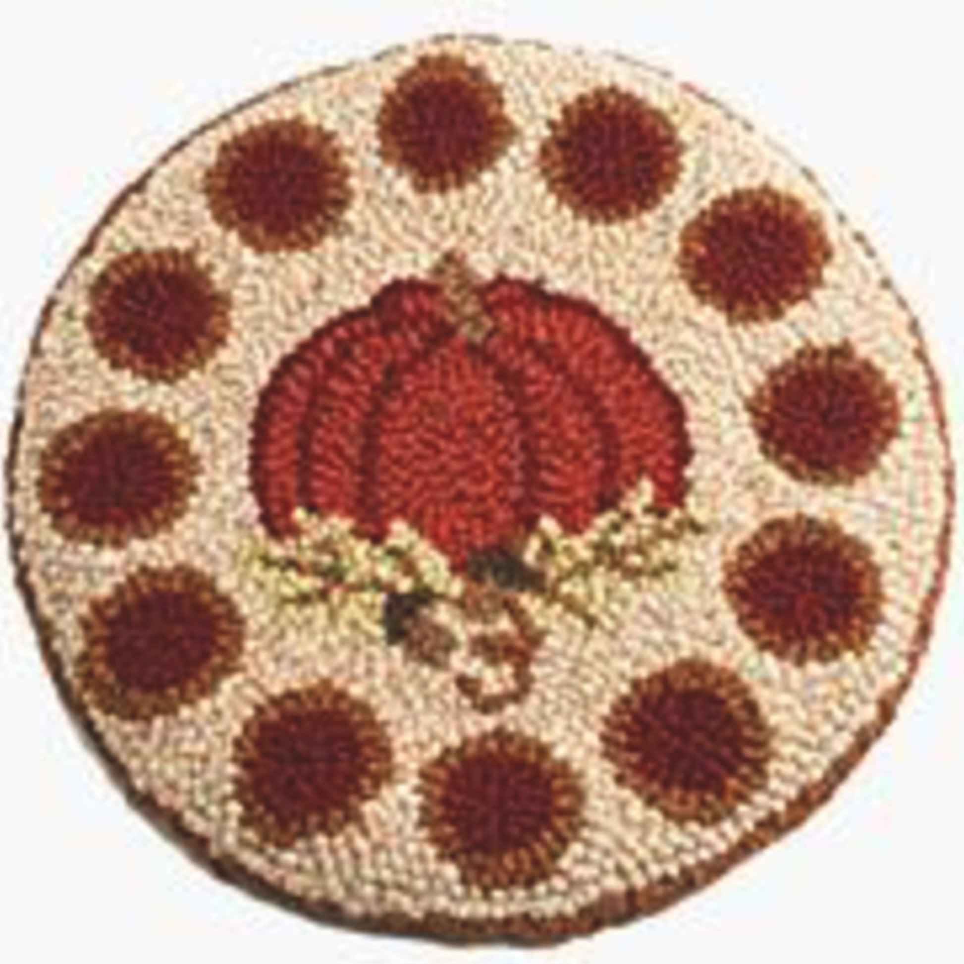 The Pumpkin Patch Hooking Pattern from Attic Heirlooms showcases a round, hand-hooked wool rug with a central pumpkin adorned with green leaves and stems, all framed by circular, dark brown dots on a cream background. This design captures an autumn-themed color palette inspired by Halcyon Yarn.