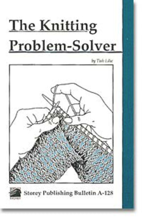 A book cover titled "The Knitting Problem Solver" by Tish Lilie, published by Workman Publishing - Storey. It features an illustration of two hands knitting with needles and yarn, making it ideal for both beginner and experienced knitters. The bottom of the cover lists "Storey Publishing Bulletin A-128" along with the store's logo.