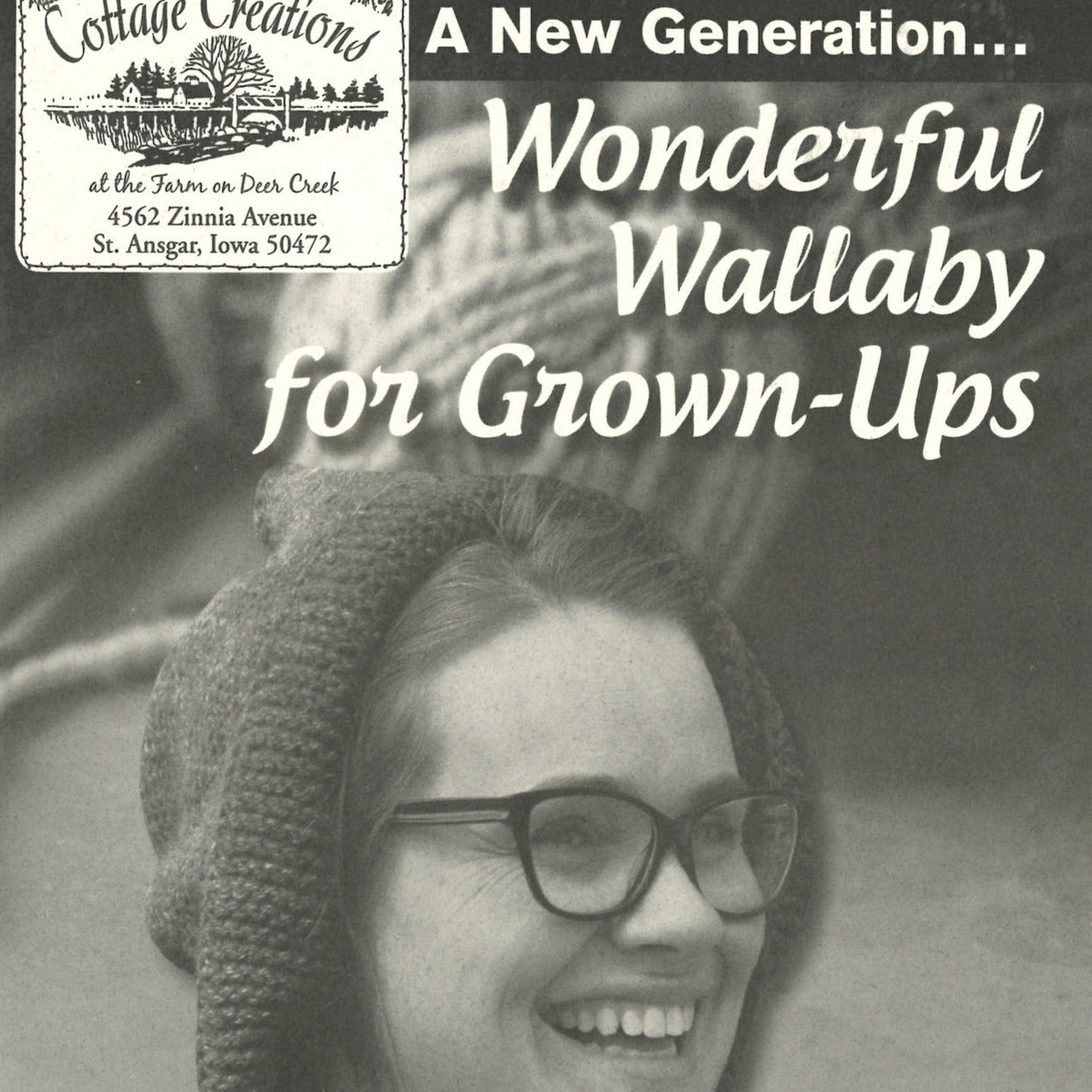 Black and white image of a person with glasses and a hooded sweatshirt, smiling. The text reads, “A New Generation... Wonderful Wallaby For Grown-Ups” from Cottage Creations, 4562 Zinnia Avenue, St. Ansgar, Iowa 50472.