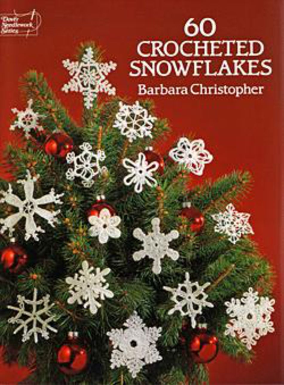 The book cover titled "60 Crocheted Snowflakes" by Barbara Christopher, from Dover Books, features a red background with a small evergreen tree decorated with intricately designed lacy crocheted snowflakes—perfect for unique Christmas gifts. The “Dover Needlework Series” logo is displayed in the upper left corner.