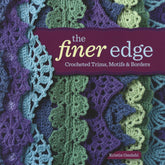 The image showcases the cover of "The Finer Edge - Crocheted Trims, Motifs & Borders" by Ingram Content. The cover exhibits detailed crochet edgings and applications in hues of blue, green, and purple, arranged in overlapping layers to create a textured appearance.