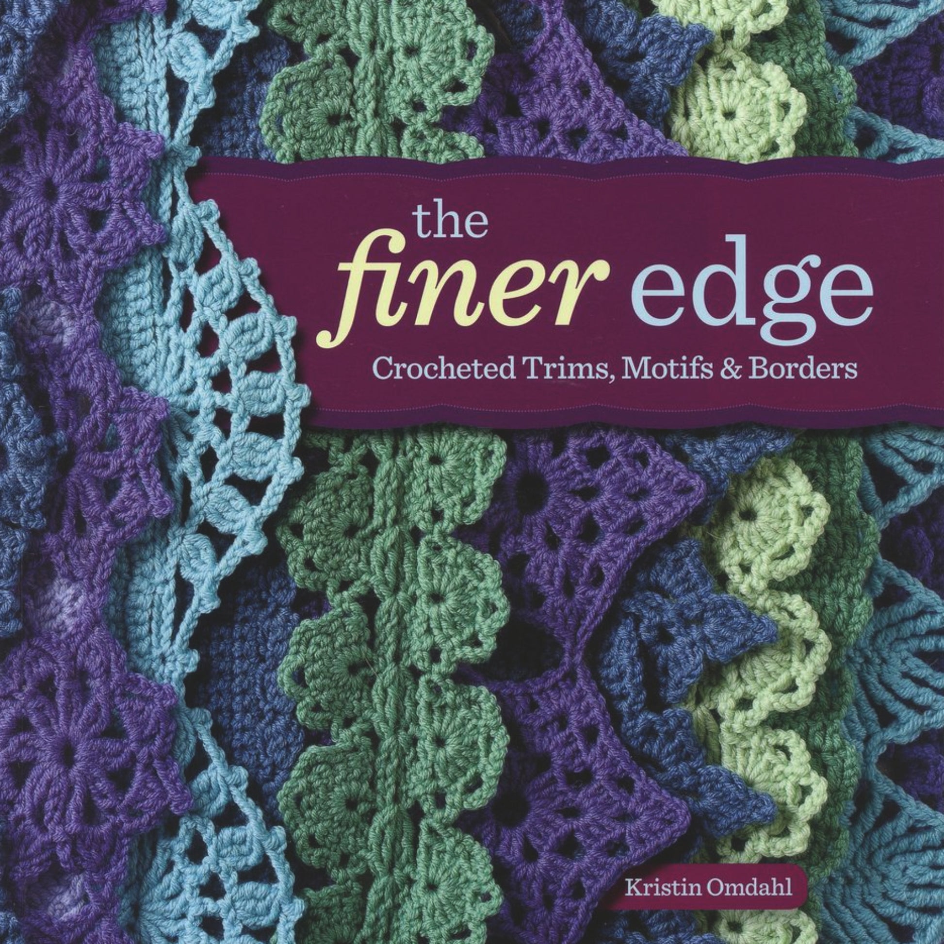 The image showcases the cover of "The Finer Edge - Crocheted Trims, Motifs & Borders" by Ingram Content. The cover exhibits detailed crochet edgings and applications in hues of blue, green, and purple, arranged in overlapping layers to create a textured appearance.