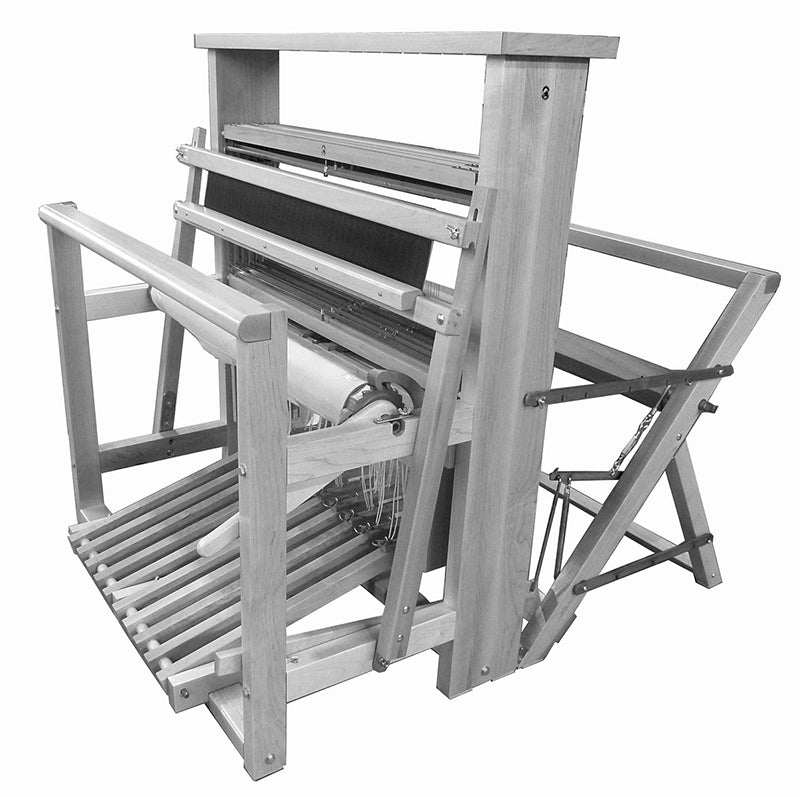 A black and white image of a Leclerc Nilus II 4-Shaft Add-on Kit by Leclerc Looms. The add-on kit for the wooden weaving loom includes multiple pedals and beams, with threads arranged on it, showcasing a traditional design used for weaving fabrics. Various components of the kit are visible, including the heddles and reed.