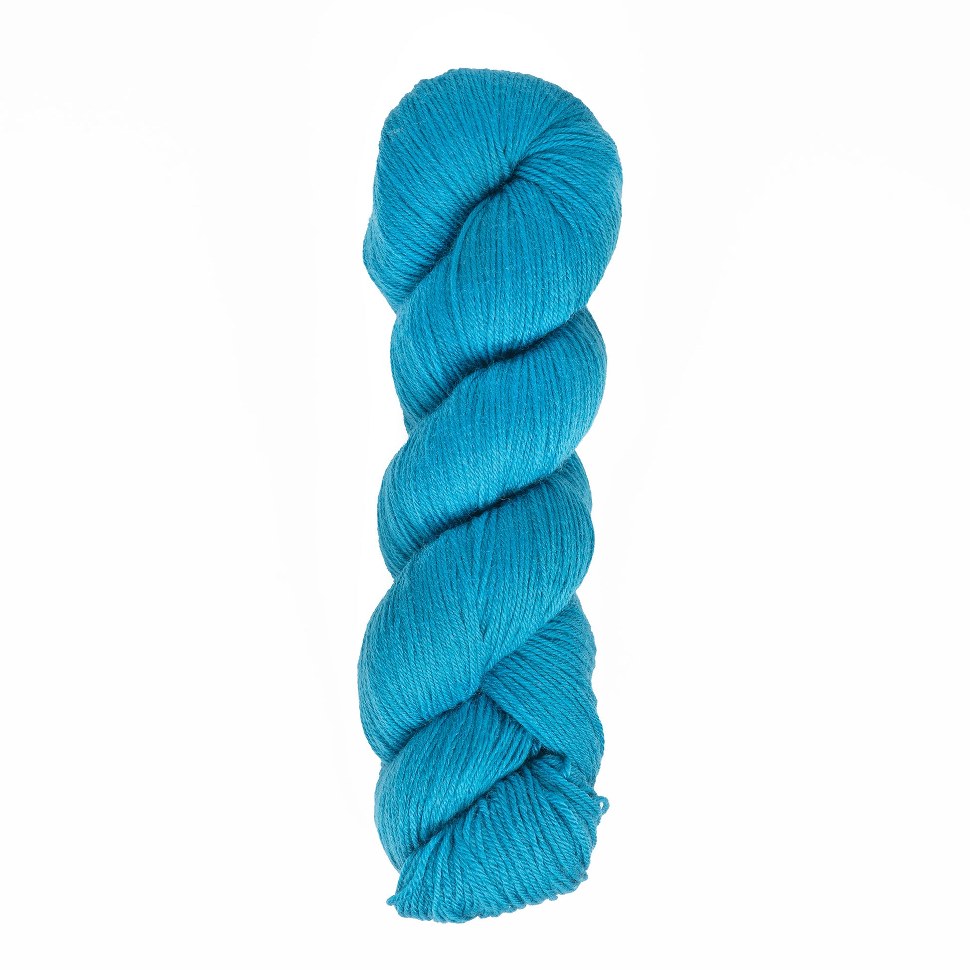 A tightly coiled skein of vibrant teal Cascade Heritage Sock Yarn against a plain white background. Made from smooth, superwash merino wool, this yarn by Cascade Yarns is perfect for projects requiring excellent stitch definition.