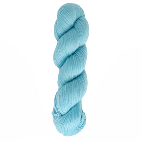 A skein of Cascade Heritage Sock Yarn by Cascade Yarns, in light blue fingering weight, crafted from superwash merino wool, is twisted neatly against a white background.