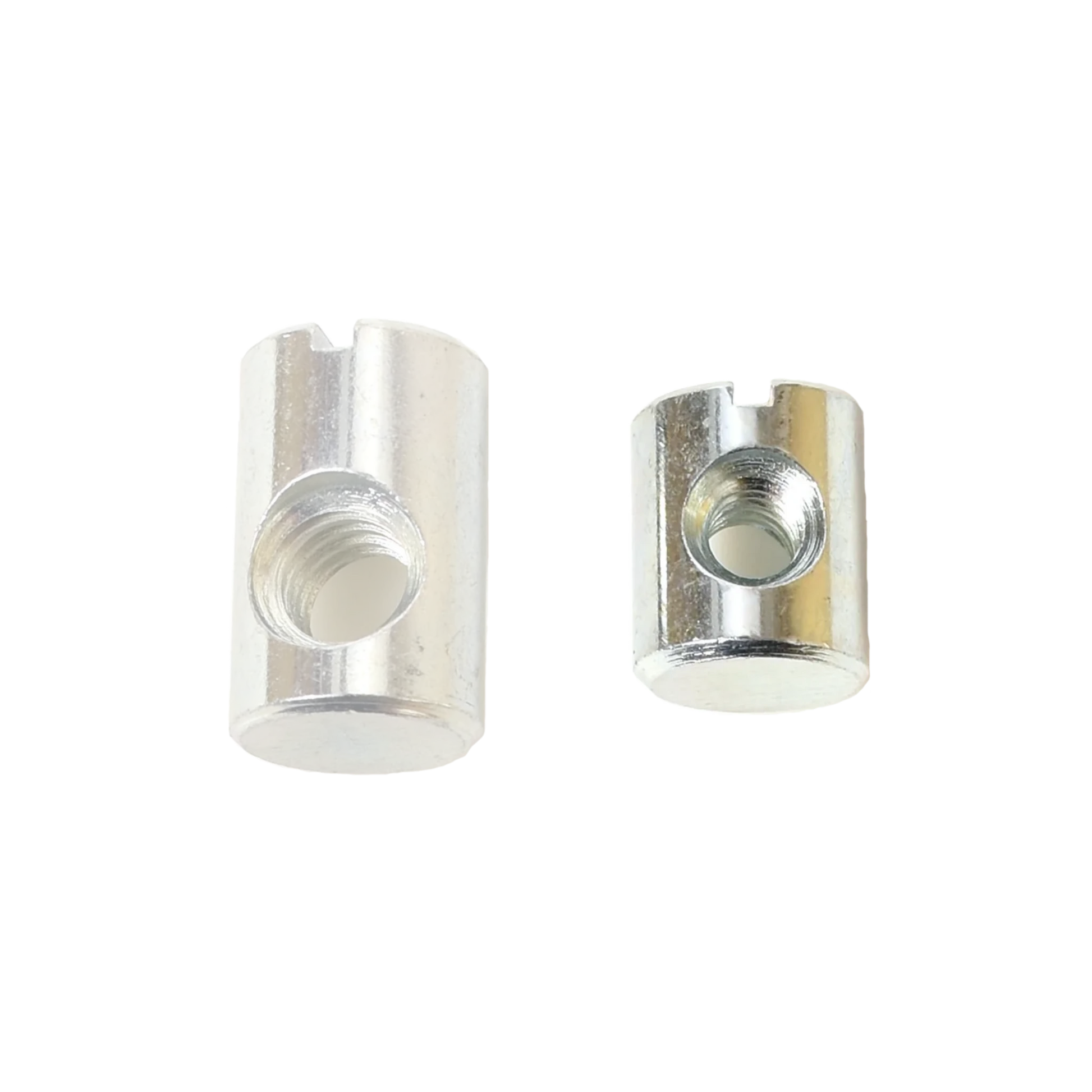 Two Schacht Replacement Barrel Nuts (from a 5-pack) by Schacht Spindle Co. are shown against a white background. The metallic cylindrical nuts have slotted tops and threaded holes. The nut on the left is larger in both height and diameter compared to the smaller nut on the right.