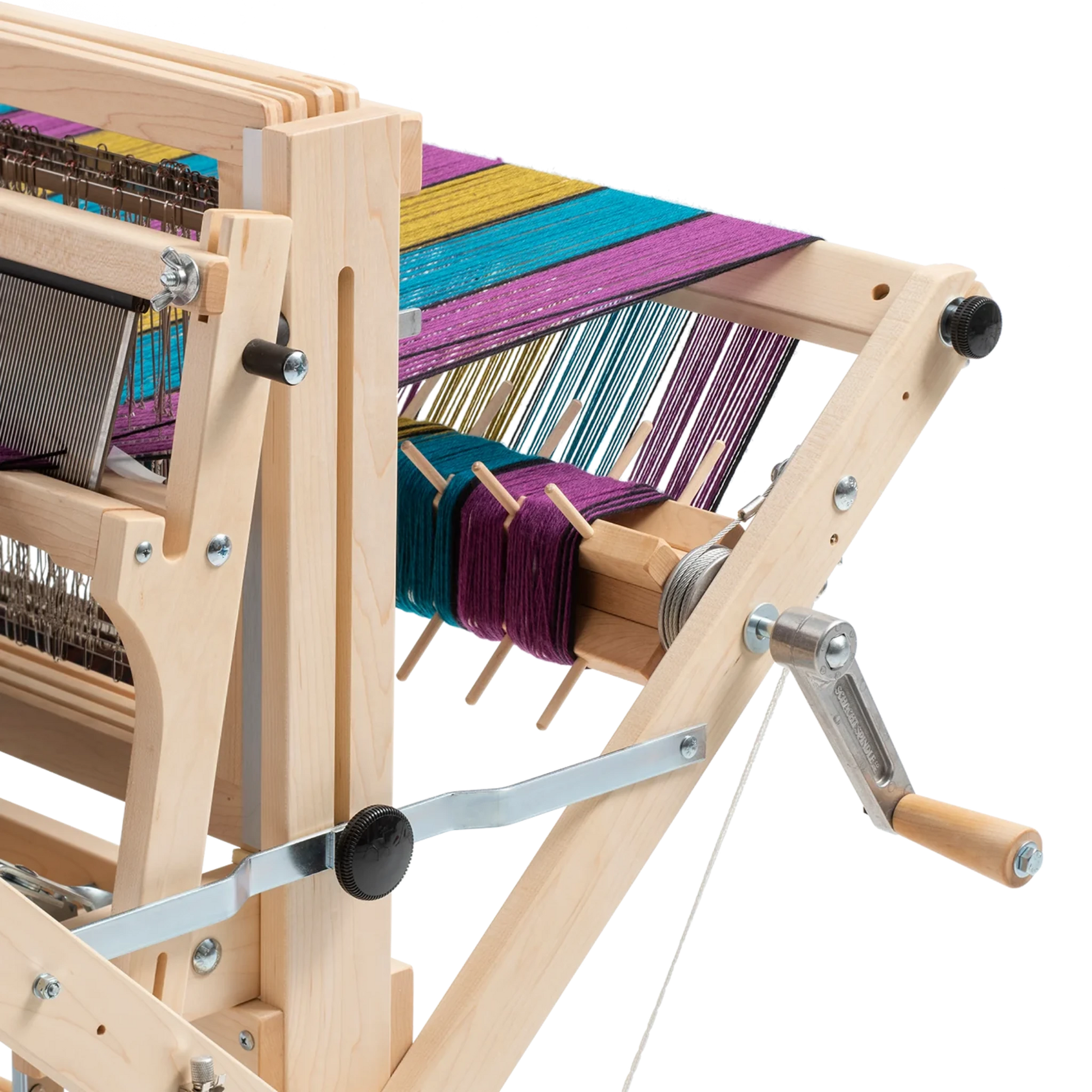 A close-up of a well-crafted Schacht Sectional Warp Beam for Wolf Looms by Schacht Spindle Co. with colorful threads being woven. Various components, including gears, levers, and Sectional Warp Beams in vibrant colors like purple, blue, and yellow, are visible. The loom kit appears highly functional for textile creation.