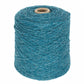 A large spool of Bartlettyarns' Bartlett Maine Wool, Sport Weight Cones in blue stands upright on a white background, with its homespun texture and tightly wound yarn visibly revealing the cardboard core.