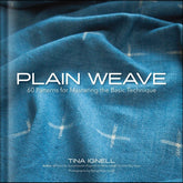 Cover of "Plain Weave; 60 Patterns for Mastering the Basic Technique" by Glimakra. It features blue woven fabric with white crosses, showcasing diverse patterns. The title is centered in a modern sans-serif font.