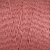 Close-up of Cotton Carpet Warp 8/4 yarn in soft pink, with tightly wound strands ensuring a smooth texture. This thick, durable yarn is perfect for colorfast knitting, crochet projects, or weaving vibrant rag rugs.