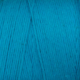 Close-up image of Cotton Carpet Warp 8/4 in bright turquoise, tightly wound in a neat bundle. The smooth and consistent texture with visible strands highlights its fibrous quality, making it ideal for crafting durable rag rugs.