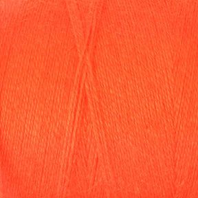 Close-up of Maurice Brassard's 8/2 Cottolin Organic Yarn in bright orange, showcasing its fine, smooth texture and tightly wound strands. Made from a cotton linen blend, this yarn emphasizes even consistency and vibrant color, making it a striking choice for knitting or crocheting projects like the Cottolin Tea Towel Kit.