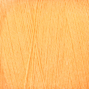 Close-up image of a ball of Maurice Brassard's 8/2 Cottolin Organic Yarn. The threads are neatly wound together, creating a woven texture. The color is a solid, vibrant orange, and the yarn appears soft and smooth to the touch—perfect for your next project with a four shaft loom or Cottolin Tea Towel Kit.