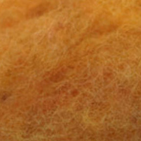 Close-up image of orange and yellow Harrisville Dyed & Carded Wool Fiber by Harrisville Designs, showcasing a textured and fuzzy surface with beautiful heathered colors.