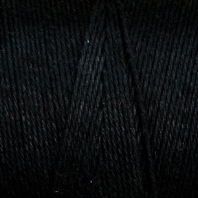 Close-up view of a ball of Maurice Brassard's Medium Cotton 16/8 Mop Yarn with a slightly glossy texture, showing the tightly wound strands and their fine details, perfect for knitting.