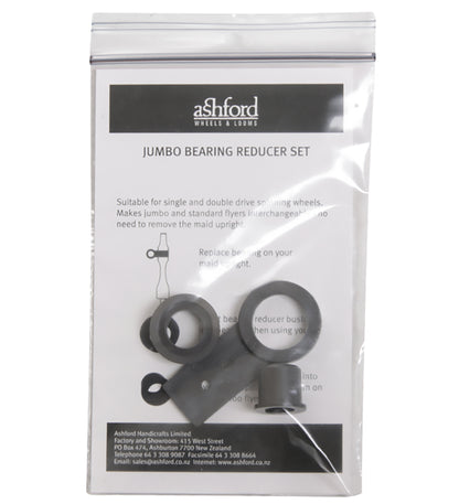 A clear plastic ziplock bag contains a document with text and a small illustrated diagram, labeled "Ashford Jumbo Flyer Bearing Reducer Set" by Ashford Handicrafts Limited. Also inside are several black plastic components. The bag is sealed, allowing the contents to be clearly visible.