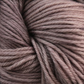 Close-up image of soft, pinkish-brown sport weight superwash merino wool yarn from Malabrigo Arroyo by Malabrigo Yarn, featuring a slightly variegated pattern. The strands are thick, twisted, and tightly wound together, creating a textured appearance perfect for crafting lightweight garments.