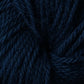 Close-up image of dark blue Halcyon Deco Rug Wool, showing the texture and individual strands in detail. The yarn, made by Caledonian Dye Works from 100% wool, appears thick and soft with a rich, deep navy blue color. This versatile yarn promises both aesthetic appeal and durability for various crafting projects.