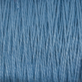 Close-up image of Supreme Corp.'s 10/2 Pearl Cotton Yarn | Mini-cone in light blue, showcasing its tightly twisted strands running parallel to one another. This versatile yarn has a soft and smooth texture, making it ideal for knitting or crochet projects. Its colorfastness ensures a consistent and soothing blue hue throughout.