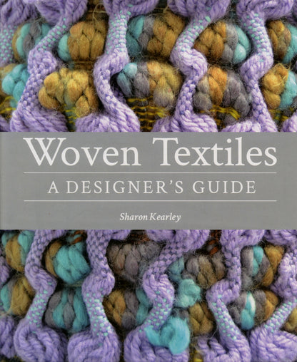 The cover of Ingram Content's book, "Woven Textiles: A Designer’s Guide," by Sharon Kearley features a close-up image of intricately woven fabric in shades of purple, green, and yellow. The title is prominently displayed in a bold, white font on a grey background, highlighting various weaving techniques.