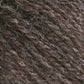 Close-up of Bartlettyarns Maine Wool Yarn, fibers loosely wound together, showcasing a textured and slightly coarse surface. The classic worsted weight yarn features a mix of dark and light, heathered colors that give it a rich, marbled appearance.